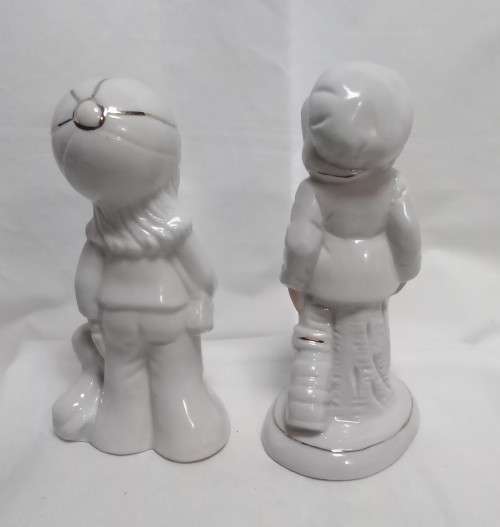 Two very cute vintage Capodimonte boy figurines