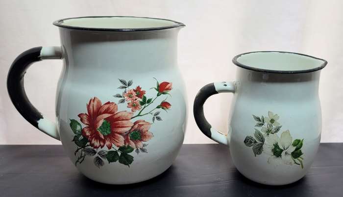 Two stunning vintage Enamel jugs