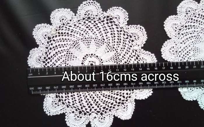 4 Beautiful Crocheted doiles - about 16cms across