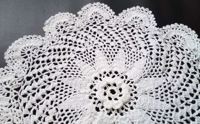 4 Beautiful Crocheted doiles - about 16cms across