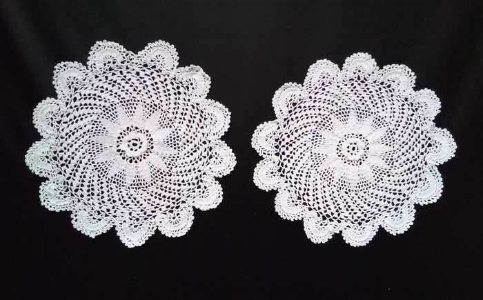 2 Beautiful Crocheted doilies - about 16cms across