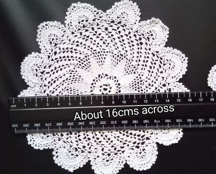 2 Beautiful Crocheted doilies - about 16cms across