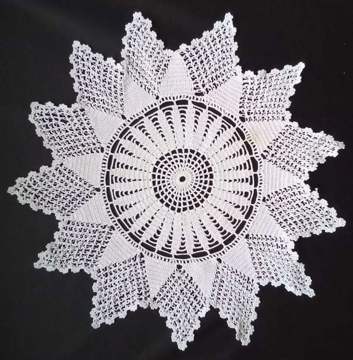 Beautiful Crocheted doily - about 32cms across