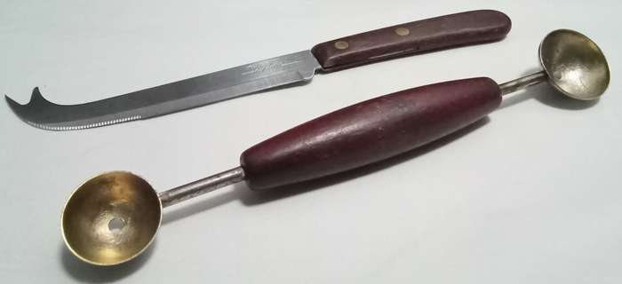 Two vintage utensils - cheese knife and melon baller