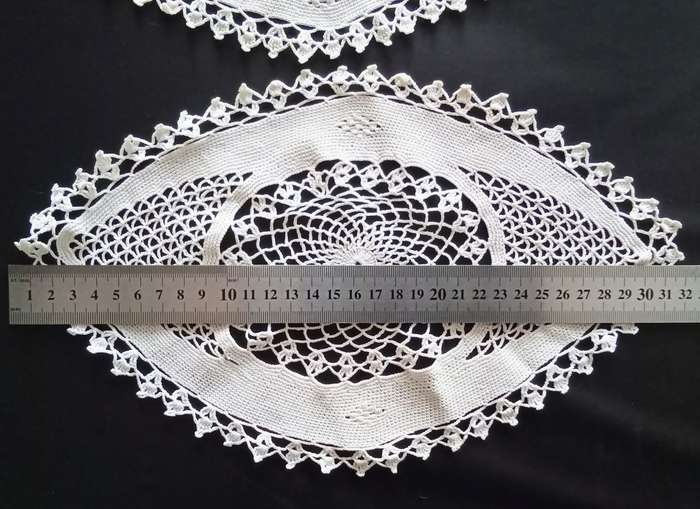 Two lovely crocheted Vintage white oval doilies
