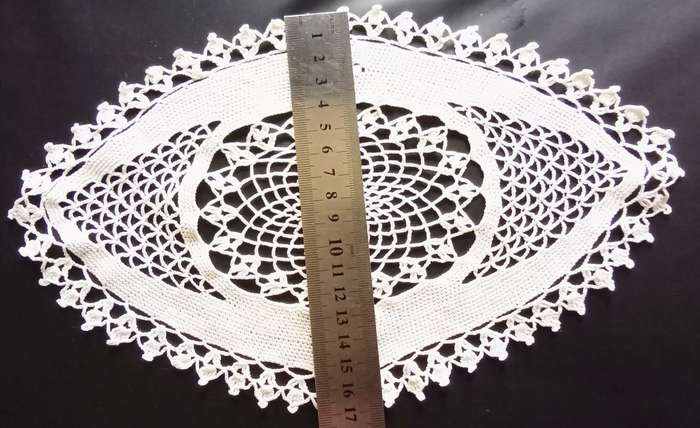 Two lovely crocheted Vintage white oval doilies