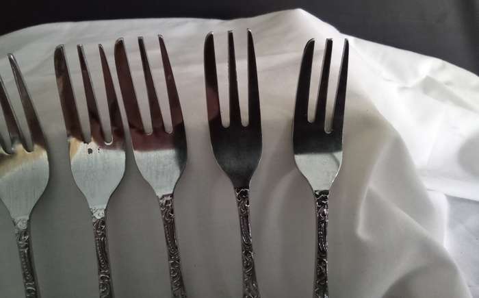 Six vintage chrome plated cake forks