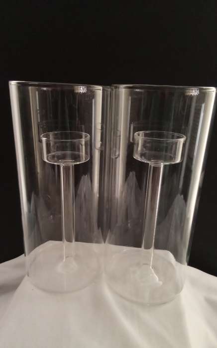 Two glass candle holders