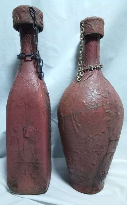 Two beautiful vintage leather clad wine bottles