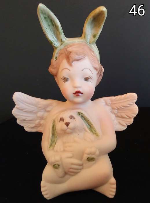 Beautiful hand painted porcelain Angel with bunny ears