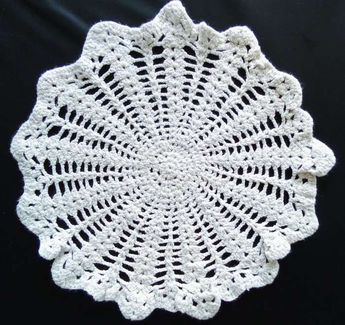 Lovely off-white crocheted doily - 30cms across