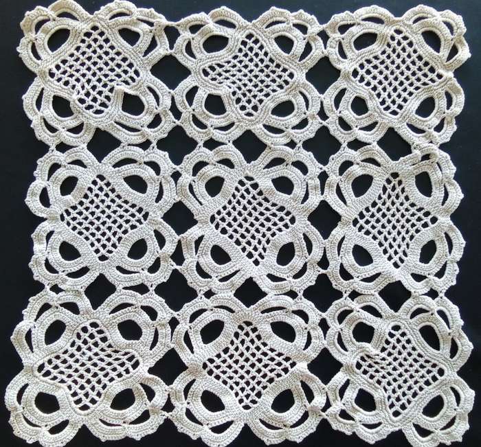 Lovely detailed beige crocheted doily - 32cms across