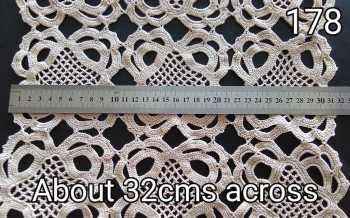 Lovely detailed beige crocheted doily - 32cms across