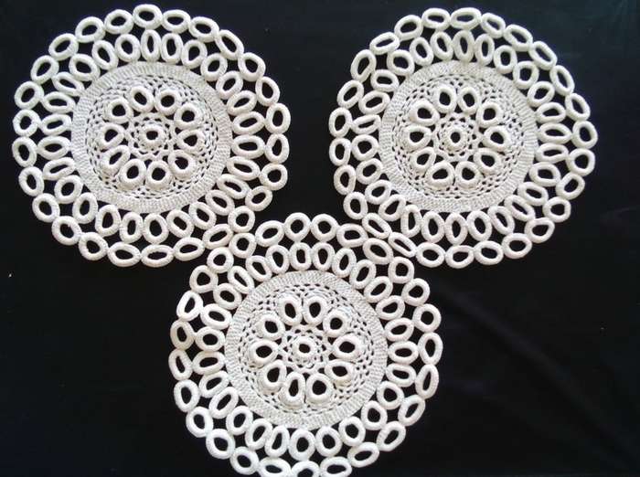 Lot of three lovely vintage doilies 23cms across