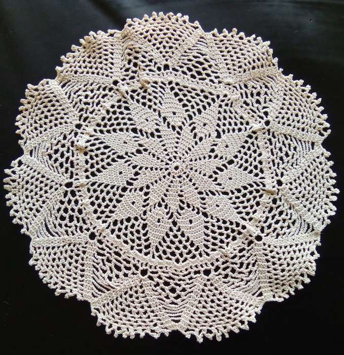 Fine beige vintage crocheted doily