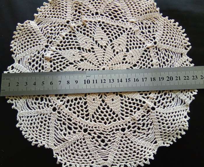 Fine beige vintage crocheted doily