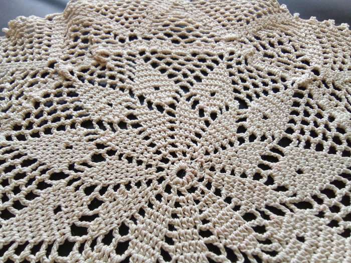 Fine beige vintage crocheted doily