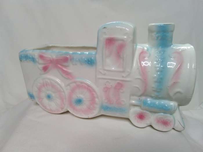 Cute vintage florist`s baby vase