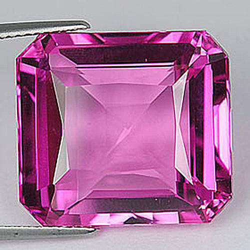 !!HUGE!! 39.02ct STUNNING RASPBERRY PINK TOPAZ. EMERALD CUT.