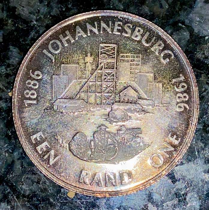 SOUTH AFRICA PROOF SILVER R1 -- 1986 --CENTENARY OF JOHANNESBURG GOLD RUSH-- NICE TONING