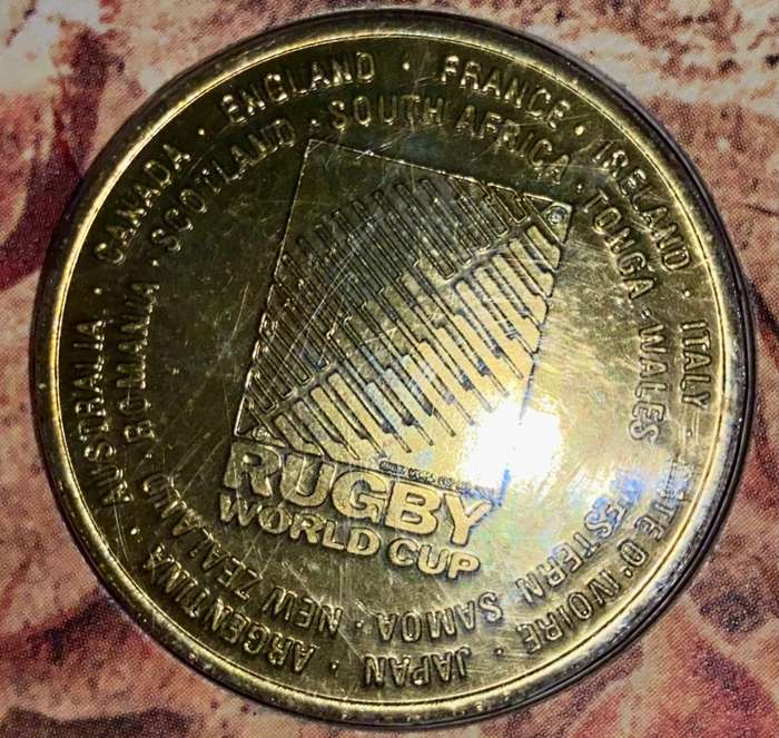 RUGBY WORL CUP 1995 COMMEMORATIVE MEDALLION IN OFFICIAL FOLDER - MEDALLION SEALED IN COIN HOLDER