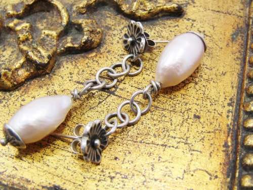 Amazing Freshwater Pearl Drop Earrings With a Flower Detail in Sterling Silver