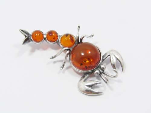 An Amazing Amber Scorpion Brooch in Sterling Silver.