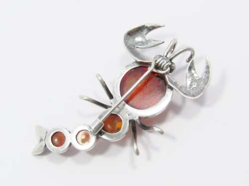 An Amazing Amber Scorpion Brooch in Sterling Silver.