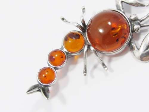 An Amazing Amber Scorpion Brooch in Sterling Silver.