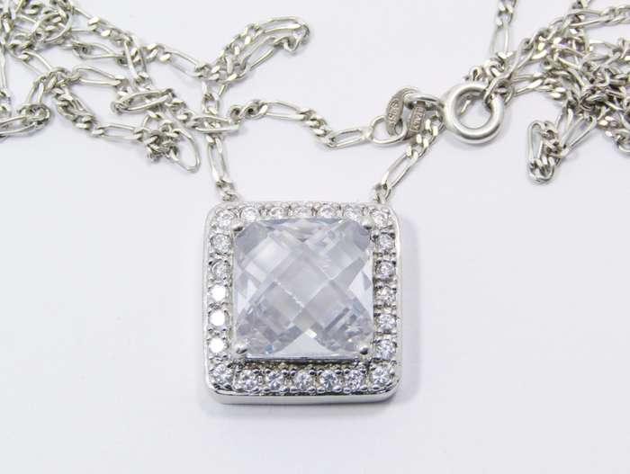 A Lovely Square Zirconia Pendant On Chain in Sterling Silver.