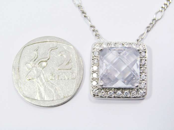 A Lovely Square Zirconia Pendant On Chain in Sterling Silver.