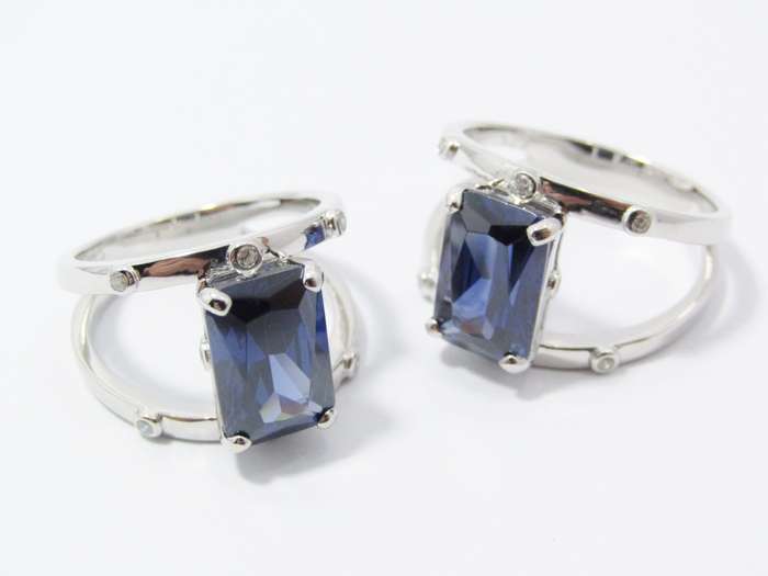 A Beautiful Double Row Into One Band Blue  Zirconia Ring in Sterling Silver.