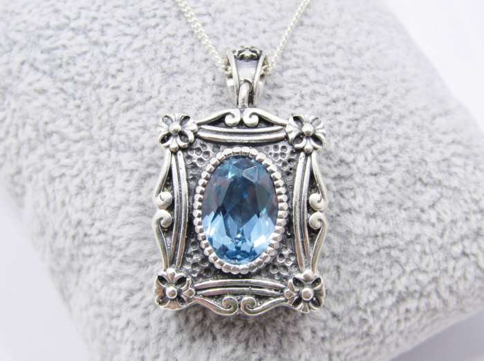 A Spectacular Blue Zirconia  Pendant On Chain in Sterling Silver.