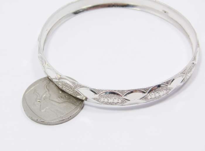 A Gorgeous Textured Bangle in Sterling Silver.