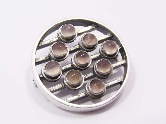 A Stunning Modernist Style Brooch With Rose Quartz stones in Silver.