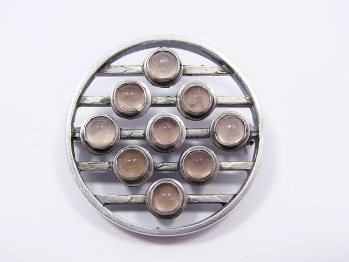 A Stunning Modernist Style Brooch With Rose Quartz stones in Silver.