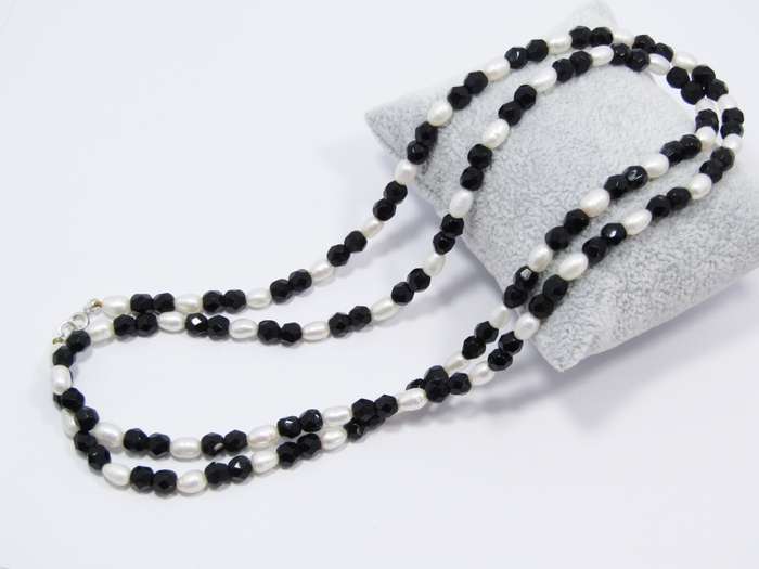 A Freshwater Pearls and Black Jet Beads With a Sterling Silver Clasp