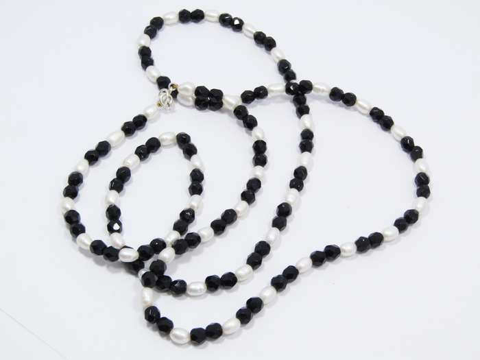 A Freshwater Pearls and Black Jet Beads With a Sterling Silver Clasp