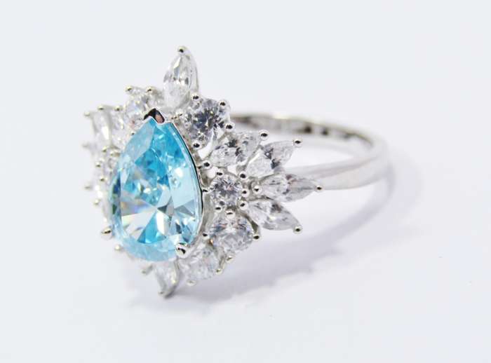 A Gorgeous Sea Green Zirconia Cluster Ring in Sterling Silver.