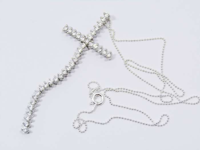 A Beautiful Long Zirconia Cross On Chain in Sterling Silver.