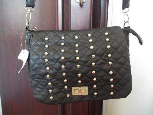 Beautiful designer style ladies Soft leather look hand bag in  BLACK padded style. Very elegant