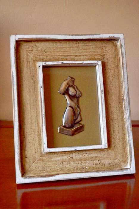Pewter Body Art on Distressed Wooden Frame