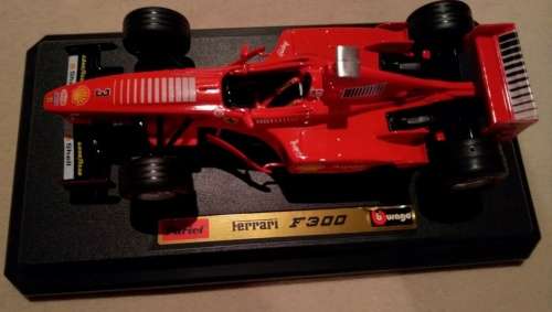 Ferrari F300 F1 1998 red (M.Schumacher) 1:24 Bburago NEW+boxed  #2279 instant wheels