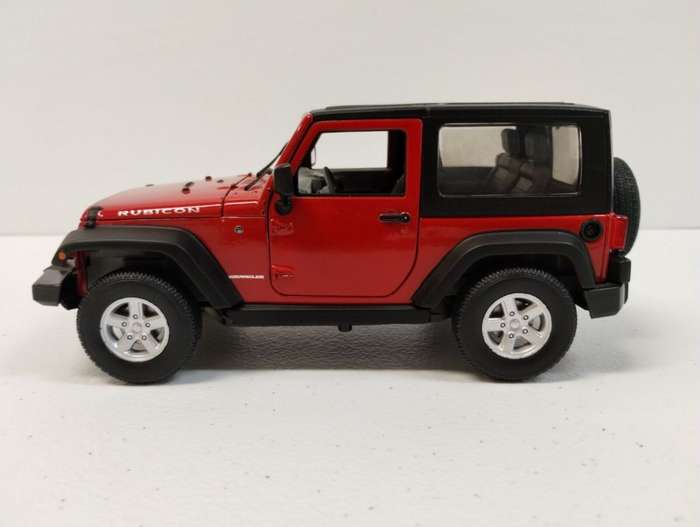 Jeep Wrangler Rubicon 2007 red 1/24 Welly NEW+boxed  #2020 instant wheels