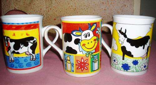 FOR THE COLLECTER MUGS WITH PICTURES OF COWS