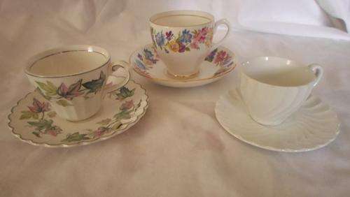 BEAUTIFUL  PORCELAIN CUPS AND SAUCERS 2 X DEMITASSE DUOS +1 X DUO