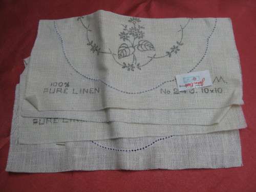Linen embroidery cloths - little side table sized.