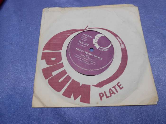 Vinyl 7` single.  45rpm.  Lionel Petersen.   Bouncy Bounce Bounce & Girls G+ VG+