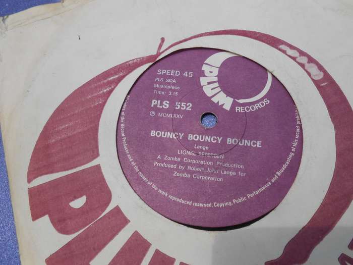 Vinyl 7` single.  45rpm.  Lionel Petersen.   Bouncy Bounce Bounce & Girls G+ VG+