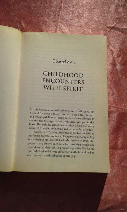 `Never Alone`   Soft cover.  Debbie Malone.  Soft cover.